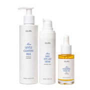 Glowy Skin Trio Collection Box featuring Gentle Cleansing Milk, Daily Anti-Age Cream, and Nourishing Facial Oil.
