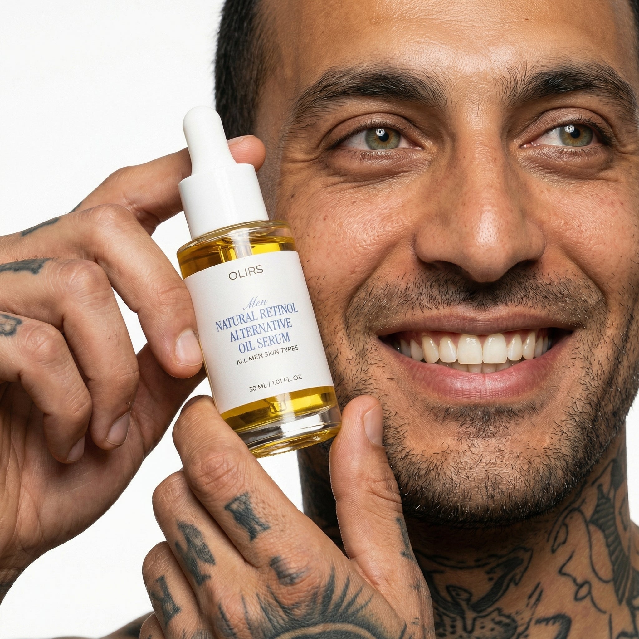 Man holding OLIRS Natural Retinol Alternative Oil Serum for all men skin types.