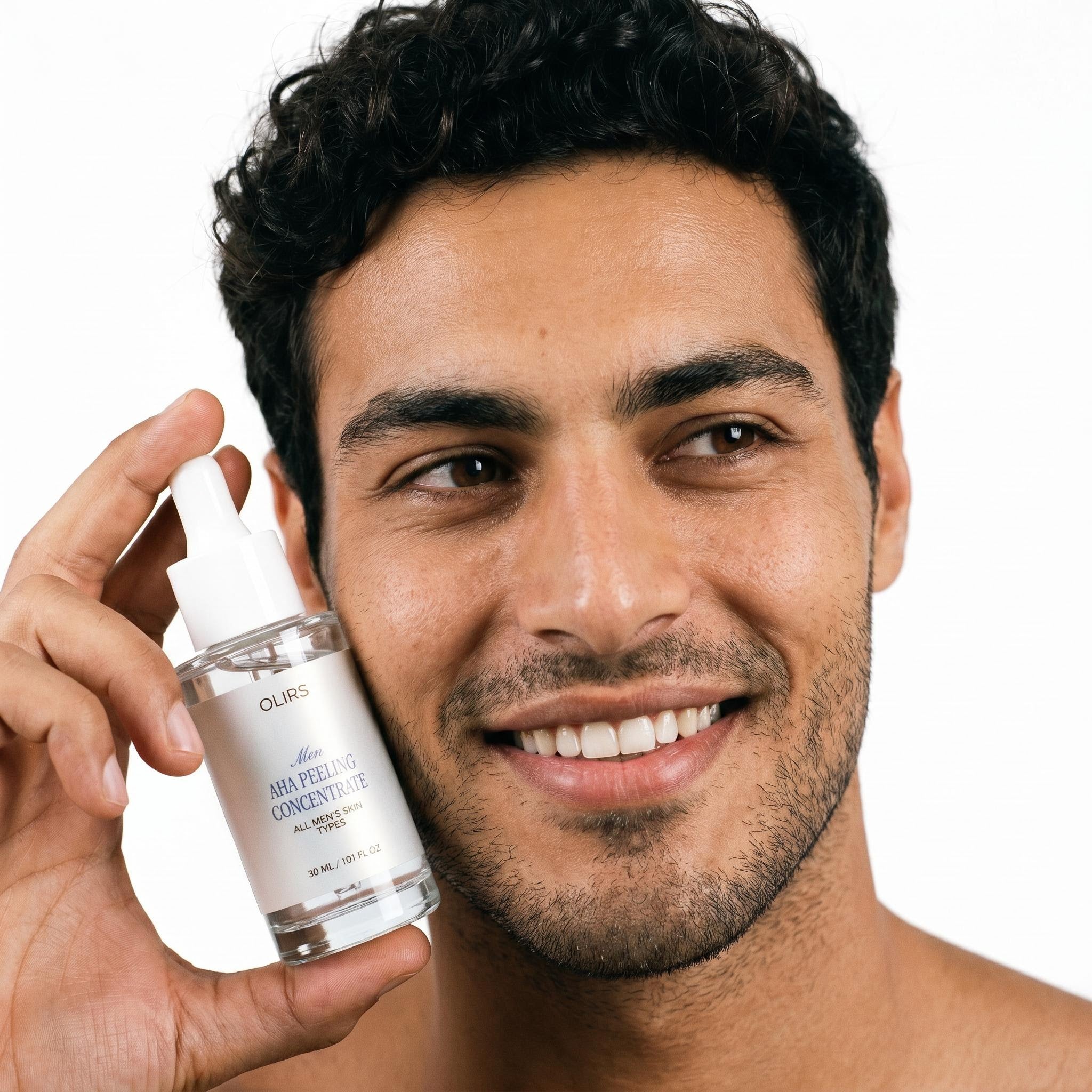 Man holding Overnight AHA Exfoliating Serum bottle, showcasing skincare routine for smoother-looking texture.
