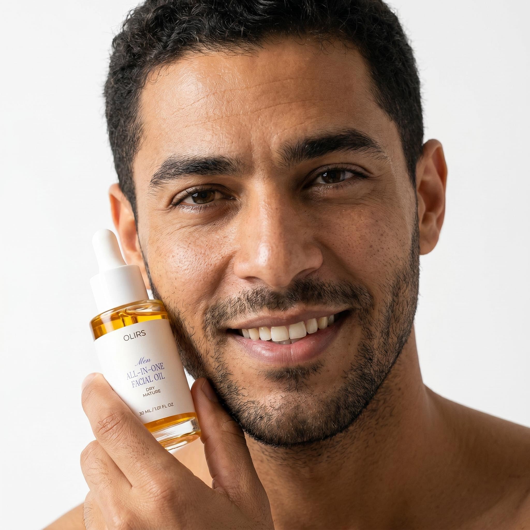 Man holding All-In-One Facial Oil, showcasing its benefits for radiant skin and hydration.