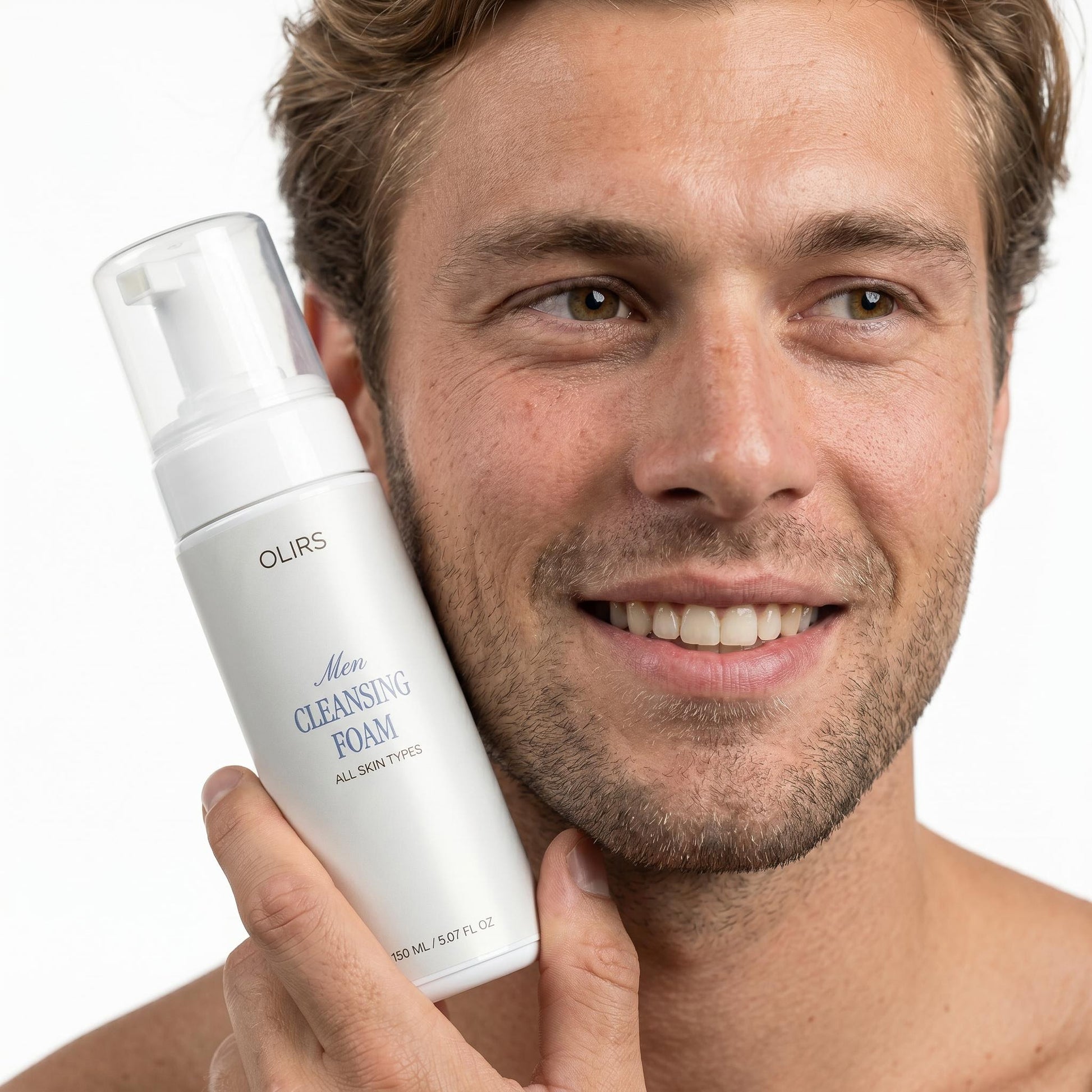 Daily Cleansing Foam bottle held by a man, showcasing a gentle cleansing solution for all skin types.