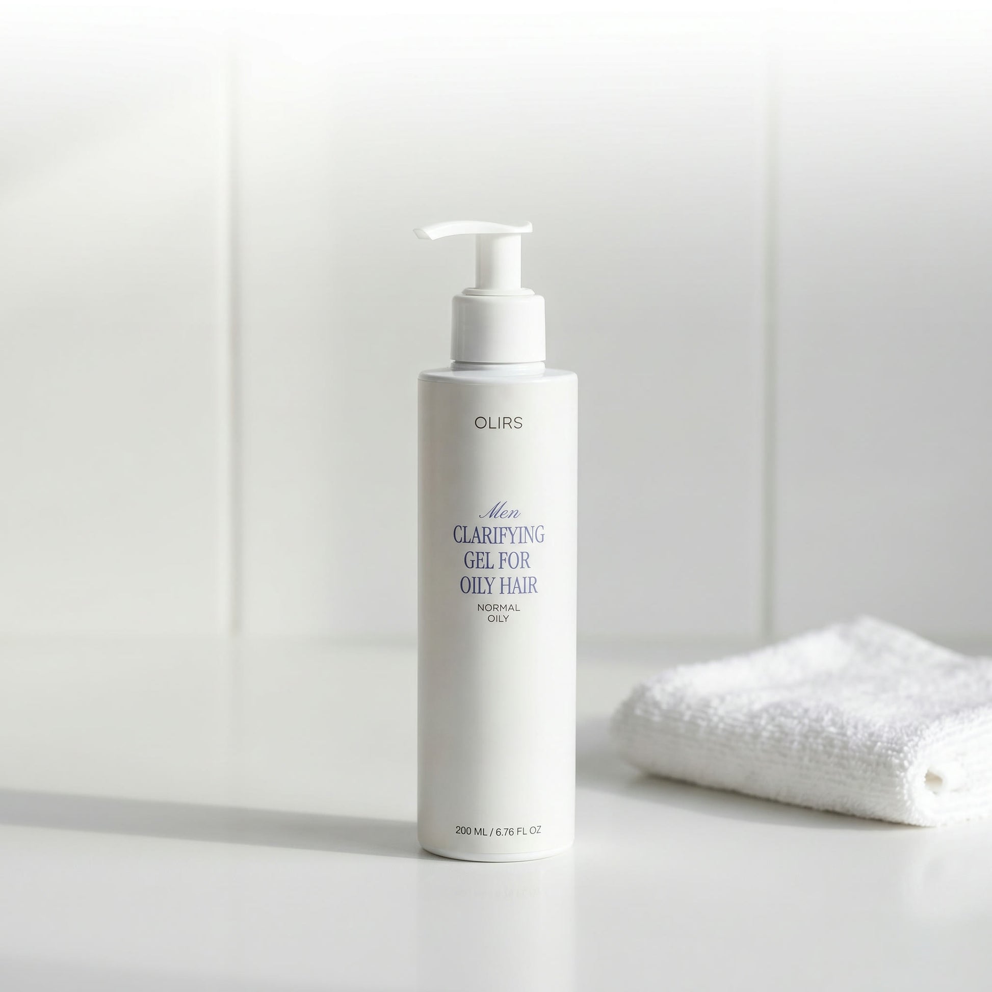 Daily Clarifying Gel Cleanser in a sleek bottle, designed for normal and oily-feeling hair.