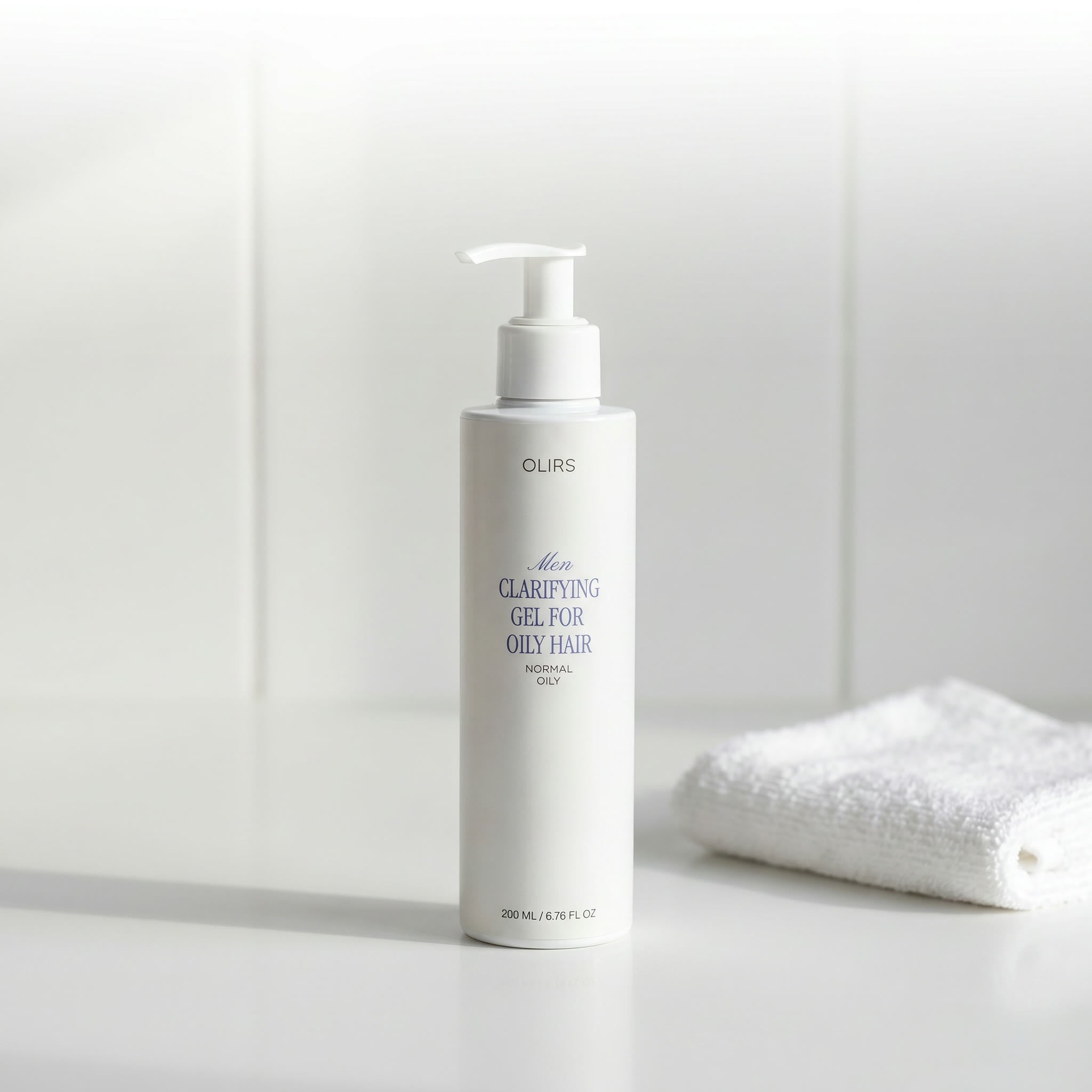 Daily Clarifying Gel Cleanser in a sleek bottle, designed for normal and oily-feeling hair.